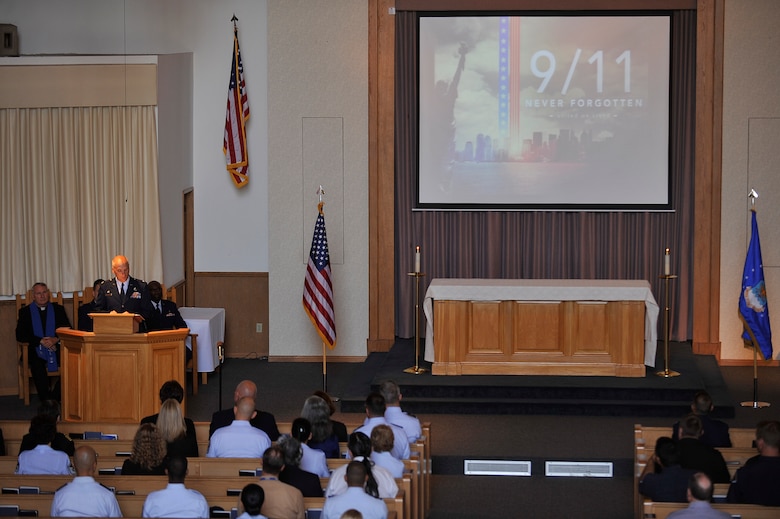 VANDENBERG AIR FORCE BASE, Calif. -- Col. Richard Boltz, 30th Space Wing commander, speaks during a 9/11 memorial ceremony at the base chapel here Monday, Sept. 11, 2011. The ceremony paid tribute to fallen heroes of the 9/11 attacks. (U.S. Air Force photo/Staff Sgt. Andrew Satran) 

  
 