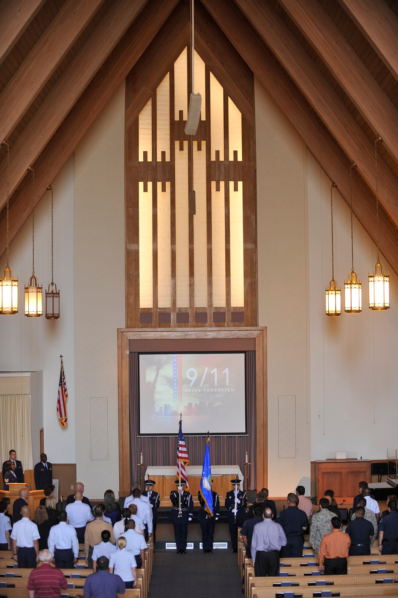 VANDENBERG AIR FORCE BASE, Calif. -- Members of the Vandenberg Honor Guard post the colors during a 9/11 Memorial ceremony at the base chapel here Monday, Sept. 11, 2011. The ceremony paid tribute to fallen heroes of the 9/11 attacks. (U.S. Air Force photo/Staff Sgt. Andrew Satran) 

 
 