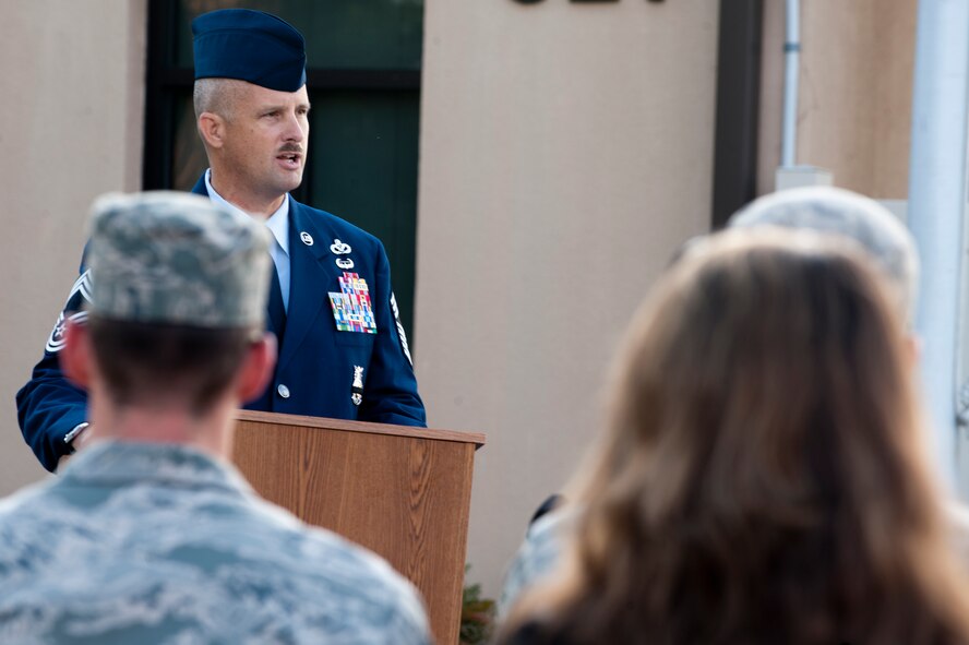 U.S. Air Force Chief Master Sgt. Jeffrey Felty, 23rd Civil Engineer Squadron, talks to the audience during the fire fighters 9-11 tribute on Moody Air Force Base, Ga. on Sept. 11, 2011. The ceremony honored the 2,977 men and women that died on Sept. 11, 2001. (U.S. Air Force photo by Staff Sgt. Joshua J. Garcia/Released)