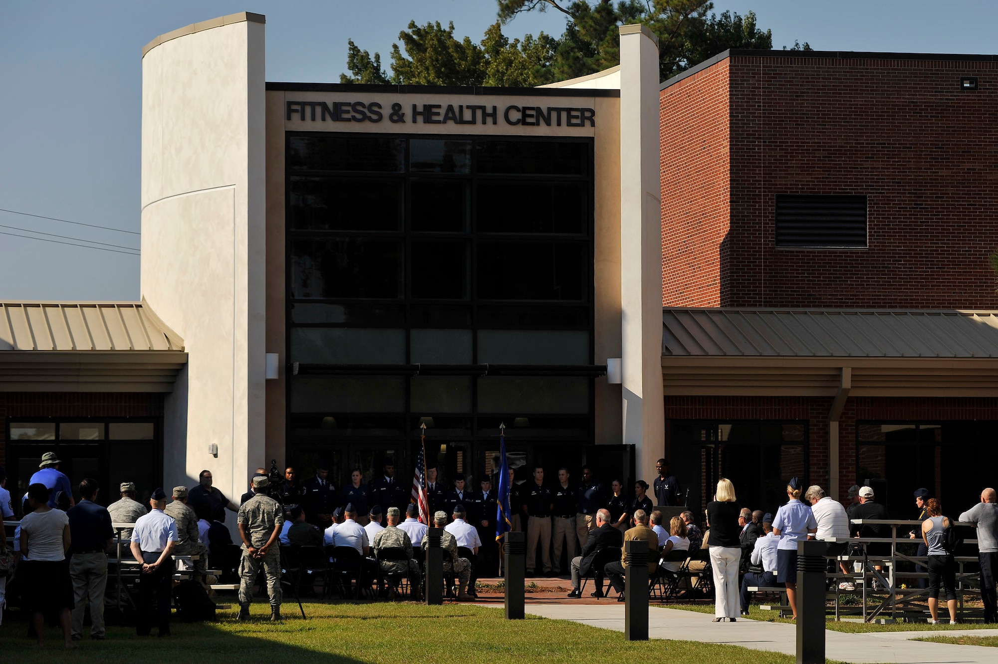 Airmen and civilians gather at the new fitness center addition for the grand opening, Sept. 12, 2011, Shaw Air Force Base, S.C. The approximately 25,000 sq. ft. addition adds a new cardio room, weight room and a men's locker room and women's locker room. (U.S. Air Force photo by Senior Airman Kenny Holston)(Released)


