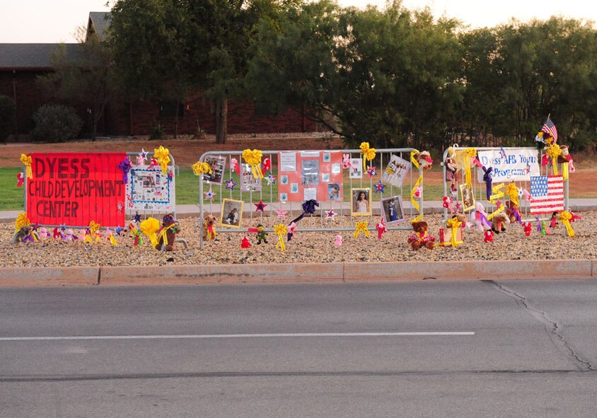 A fence stands decorated Sept. 9, 2011 in honor of the men, women and children that lost their lives during the attacks of 9/11 at Dyess Air Force Base, Texas. (U.S. Air Force photo by Senior Airman Chelsea Browning/ Released)