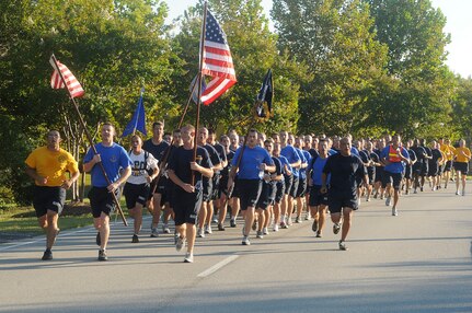 More than 200 chief, senior chief and master chief petty officers and chief selectees from Joint Base Charleston-Weapons Station made their way through the streets of Patriot’s Point during the 10th annual Heritage run, Sept. 10. The Heritage Run is designed to instill comraderie, patriotism and unit cohesiveness as well the Navy core values of Honor, Courage and Commitment. (U.S. Navy photo/Mass Communication Specialist 1st Class Jennifer Hudson/released