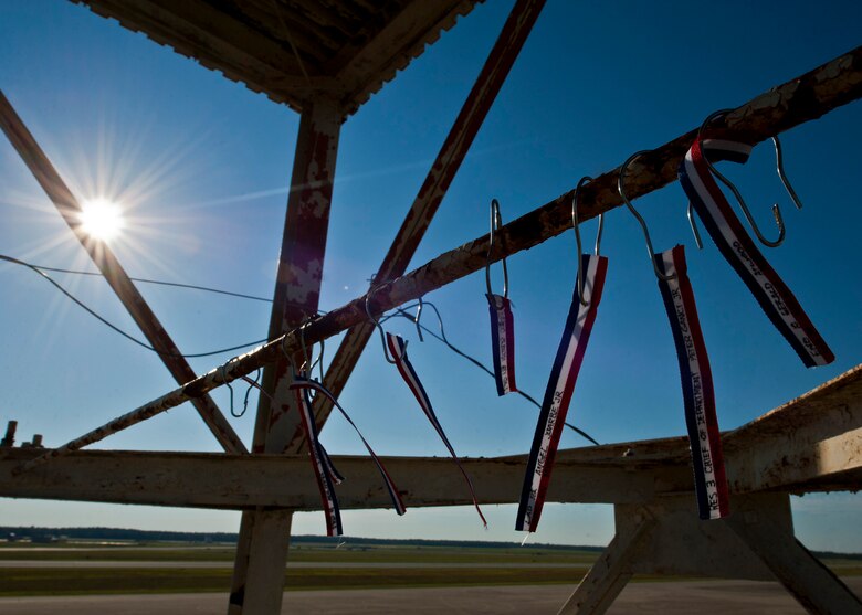Red, white and blue streamers sway in the breeze from the air traffic control tower at Duke Field Sept. 11.  They were attached to the tower by 96th Air Base Wing firefighters during the first ever 9/11 memorial stair climb at Duke Field.  Thirteen firefighters commemorated the occasion by continuously climbing the steps of the ATC tower to simulate the 110-flight climb of the World Trade Center.  (U.S. Air Force photo/Tech. Sgt. Samuel King Jr.)
