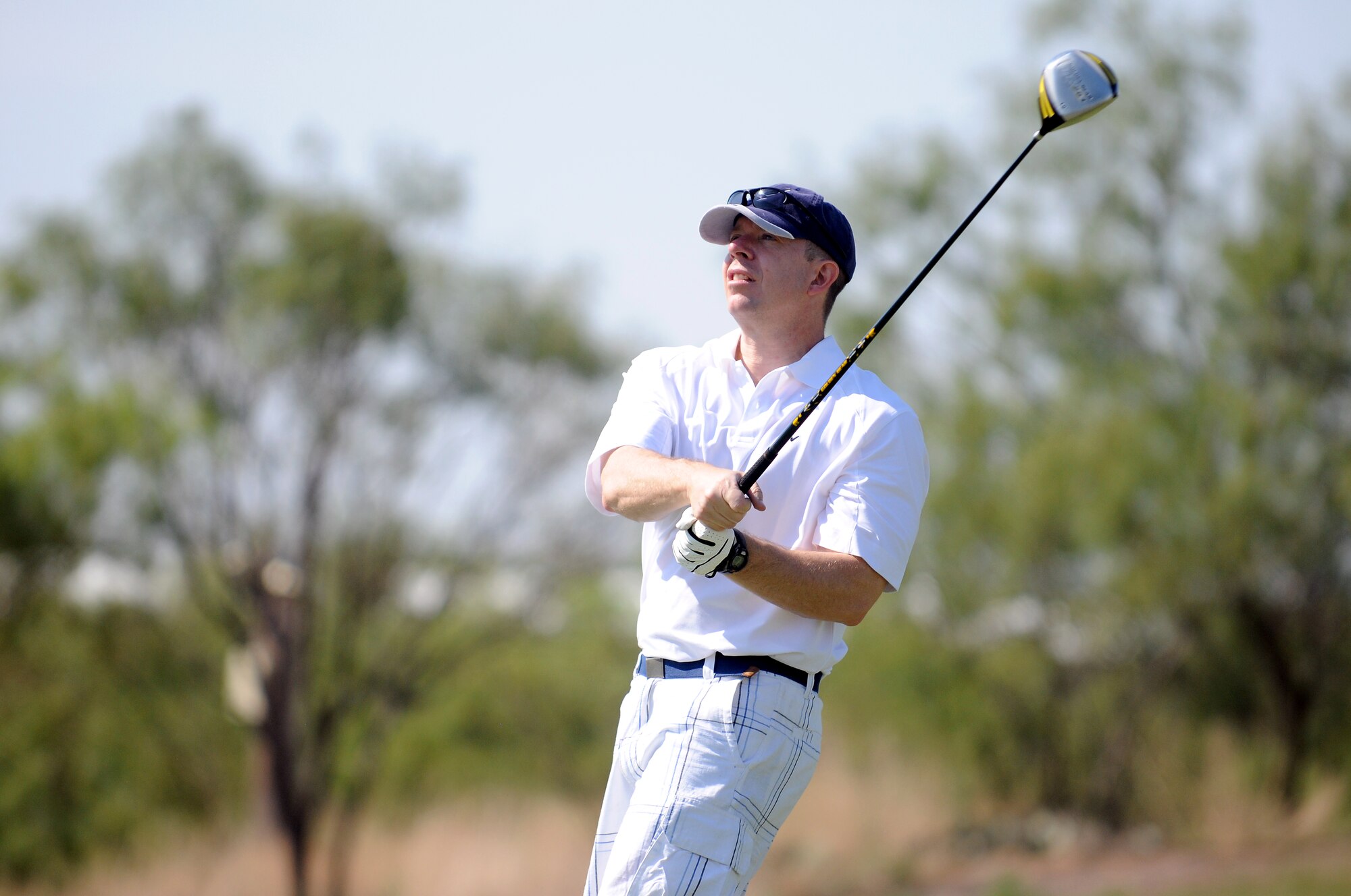 SAN ANGELO, Texas – Chief Master Sgt. Brendan Criswell, 17th Training Wing Command Chief, participates in the 2011 Friendship Golf Tournament at Quicksand Golf Course here Sept. 9. The event was hosted by the San Angelo Chamber of Commerce.  About $3,000 was raised and donated to the First Sergeant's Council to support Operation Warmheart and other base-wide programs that support service members and their families during deployments and emergencies. (U.S. Air Force Photo /Senior Airman Heather L. Rodgers)