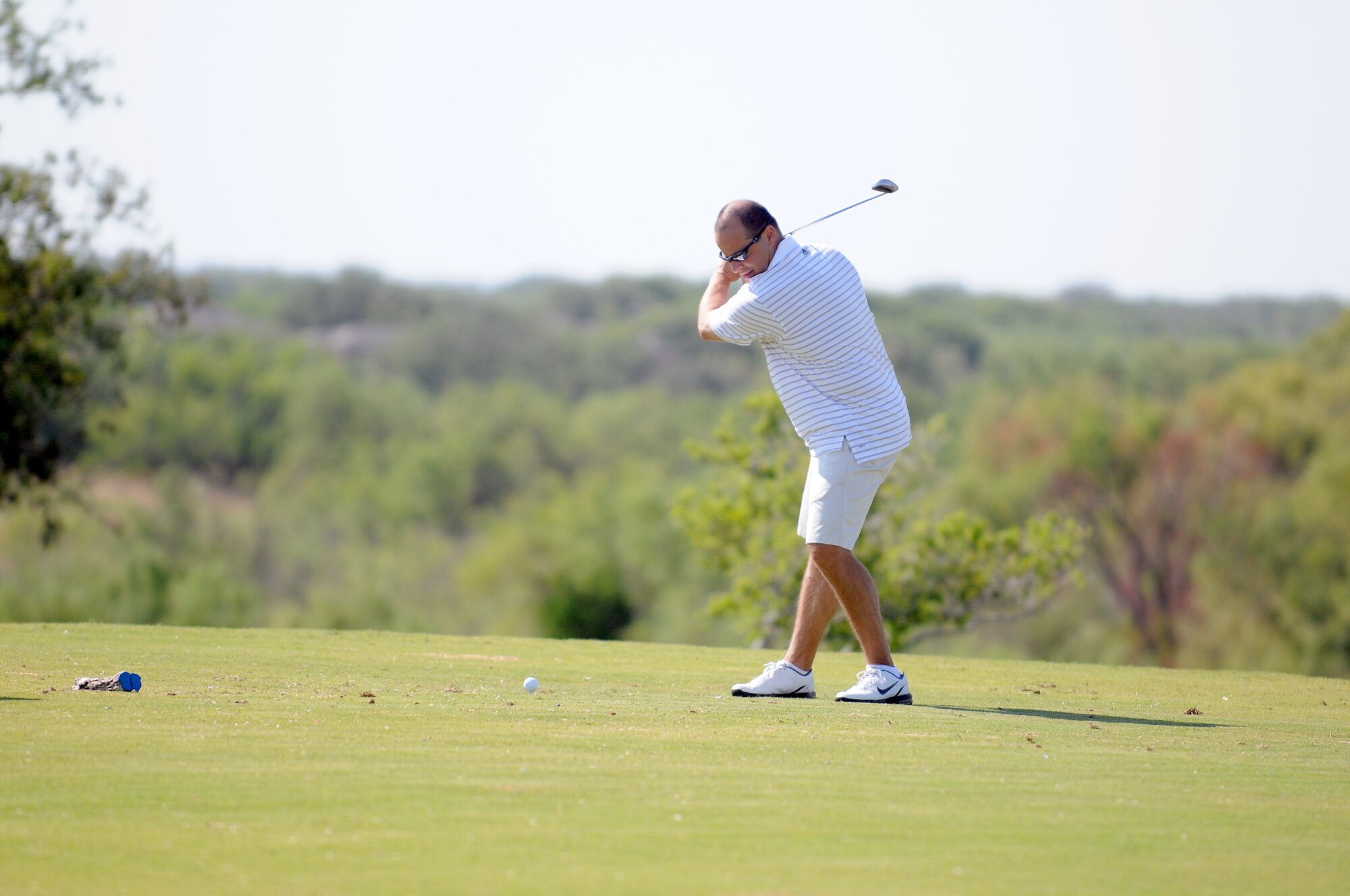 SAN ANGELO, Texas – Col. Mark Damiano, 17th Training Wing Commander, participates in the 2011 Friendship Golf Tournament at Quicksand Golf Course here Sept 9. The event was hosted by the San Angelo Chamber of Commerce.  About $3,000 was raised and donated to the First Sergeant's Council to support Operation Warmheart and other base-wide programs that support service members and their families during deployments and emergencies. (U.S. Air Force Photo /Senior Airman Heather L. Rodgers)