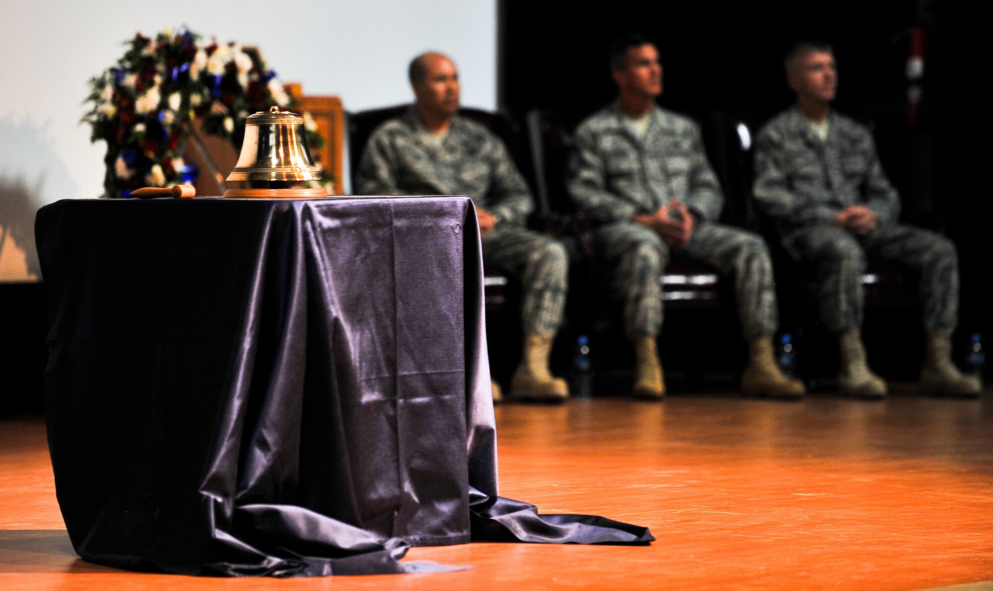 A memorial bell was struck 10 times to mark the tenth anniversary of Sept. 11, 2001, during a ceremony Sept. 11, 2011, at an undisclosed location in Southwest Asia. Between each strike, audience members were asked to reflect upon the events of that fateful day in history. (U.S. Air Force photo/Senior Airman Paul Labbe)