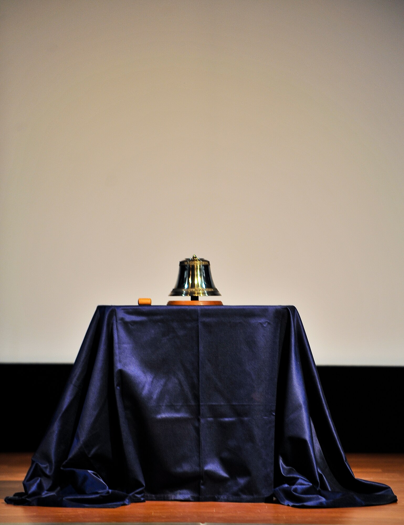 A memorial bell was struck 10 times to mark the tenth anniversary of Sept. 11, 2001, during a ceremony Sept. 11, 2011, at an undisclosed location in Southwest Asia. Between each strike, audience members were asked to reflect upon the events of that fateful day in history. (U.S. Air Force photo/Senior Airman Paul Labbe)