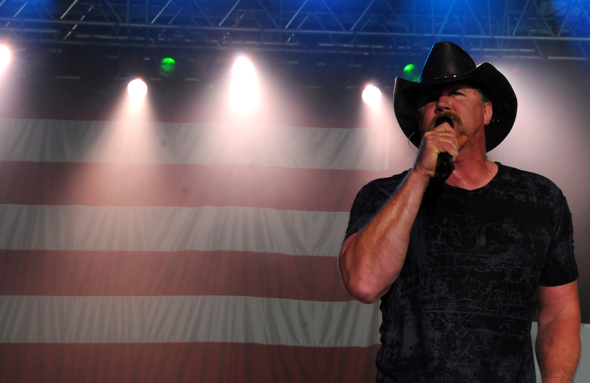 Trace Adkins performs in concert on Ramstein Air Base, Germany, Sept. 11, 2011. The concert was sponsored by the United Services Organization and Armed Forces Entertainment, and was held in honor of the tenth anniversary of the terrorist attacks that occured on Sept. 11, 2001. (U.S. Air Force photo by Airman 1st Class Ciara M. Travis)