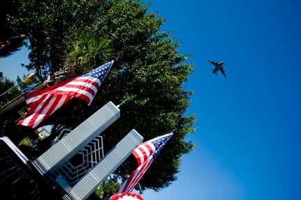 A Joint Base Charleston C-17A Globemaster III performs a fly-over during a Retreat ceremony to commemorate the 10th anniversary of the 9/11 attacks, Sept. 9 at JB CHS - Air Base. During the ceremony, a 9/11 monument (show here) constructed by members of the 437th Maintenance Squadron, was unveiled. (U.S. Air Force photo/ Staff Sgt. Greg Biondo) 
