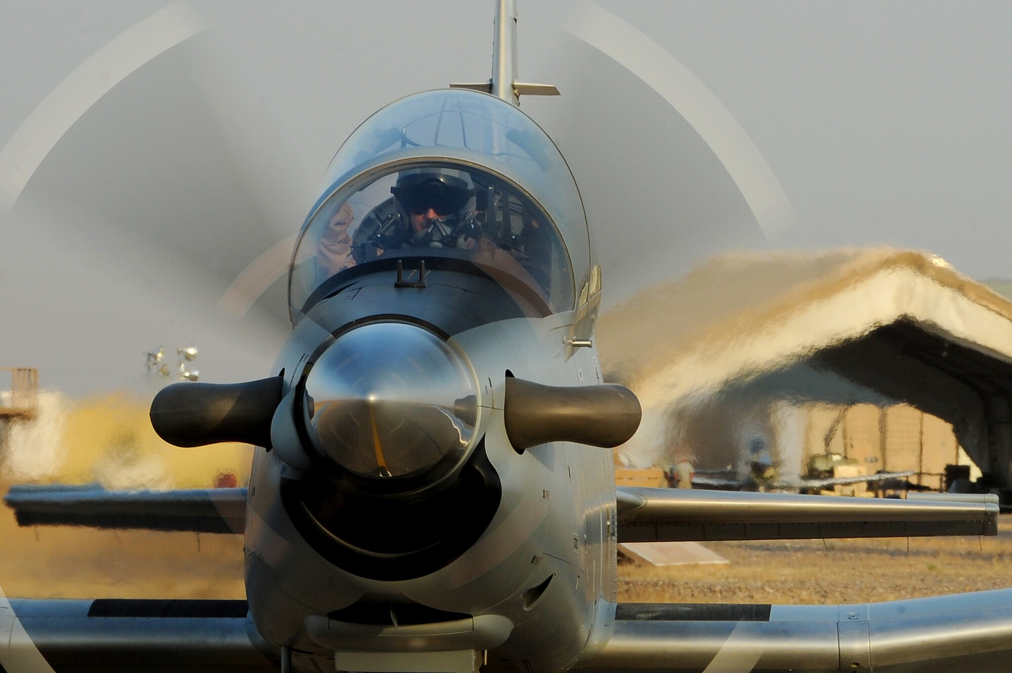 A T-6 Texan II aircraft taxis before takeoff Sept. 4, 2011, at Camp Speicher, Iraq. The 52nd Expeditionary Flying Training Squadron turned over flight training operations to the Iraqi air force Squadron 203 Sept. 5. The T-6 is a single-engine, two-seater designed to train joint primary pilot training students in basic flying skills common to U.S. Air Force and Navy pilots, including six other countries.  (U.S. Air Force photo/Staff Sgt. Mike Meares)