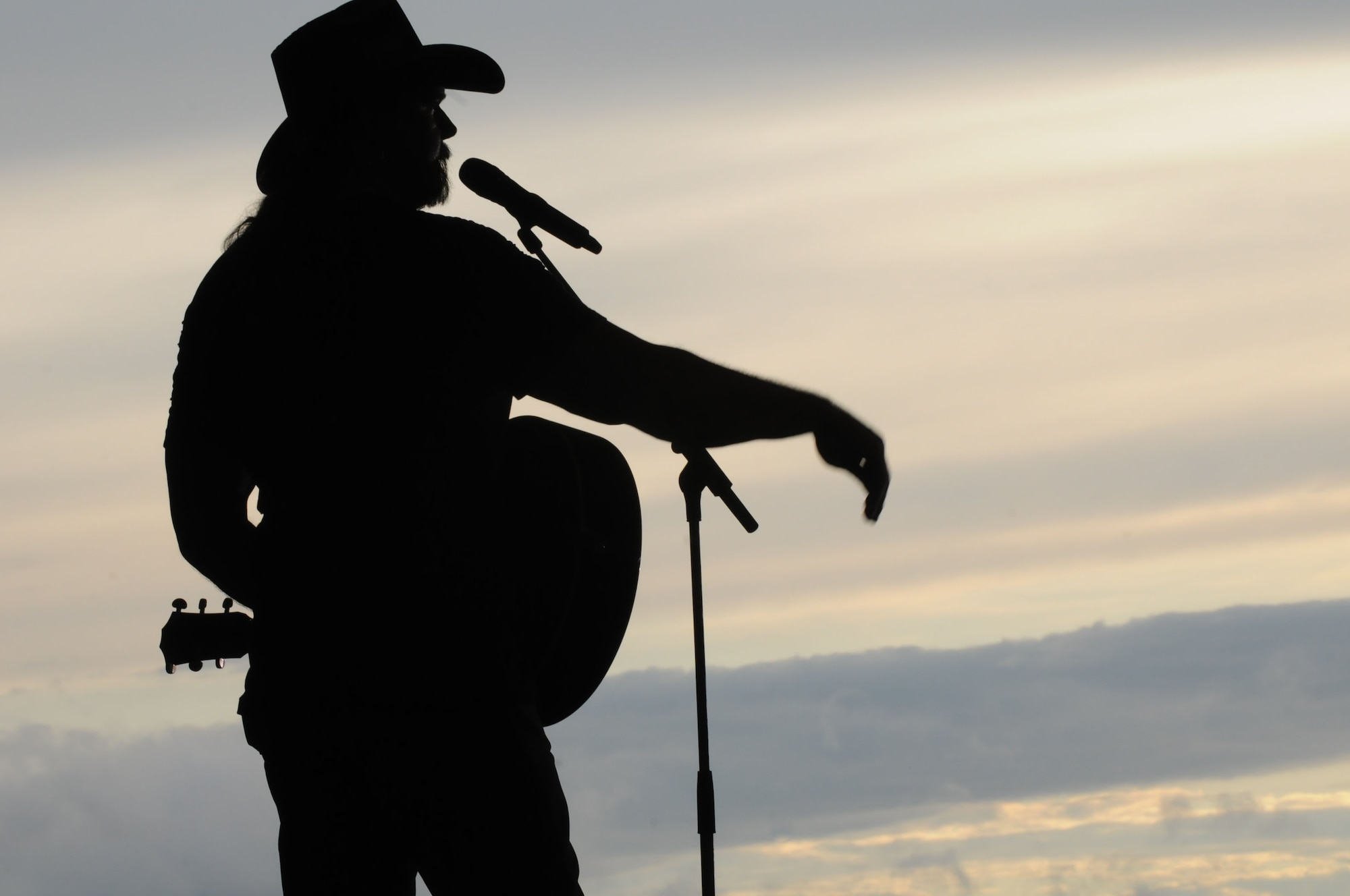 Trace Adkins, singer, song writer and entertainer, performs during a USO sponsored concert, Ramstein Air Base, Germany, Sept. 11, 2011. The Trace Adkins concert was designed to entertain and help boost the morale of troops and their families. (U.S. Air Force photo by Airman 1st Class Kendra Alba)