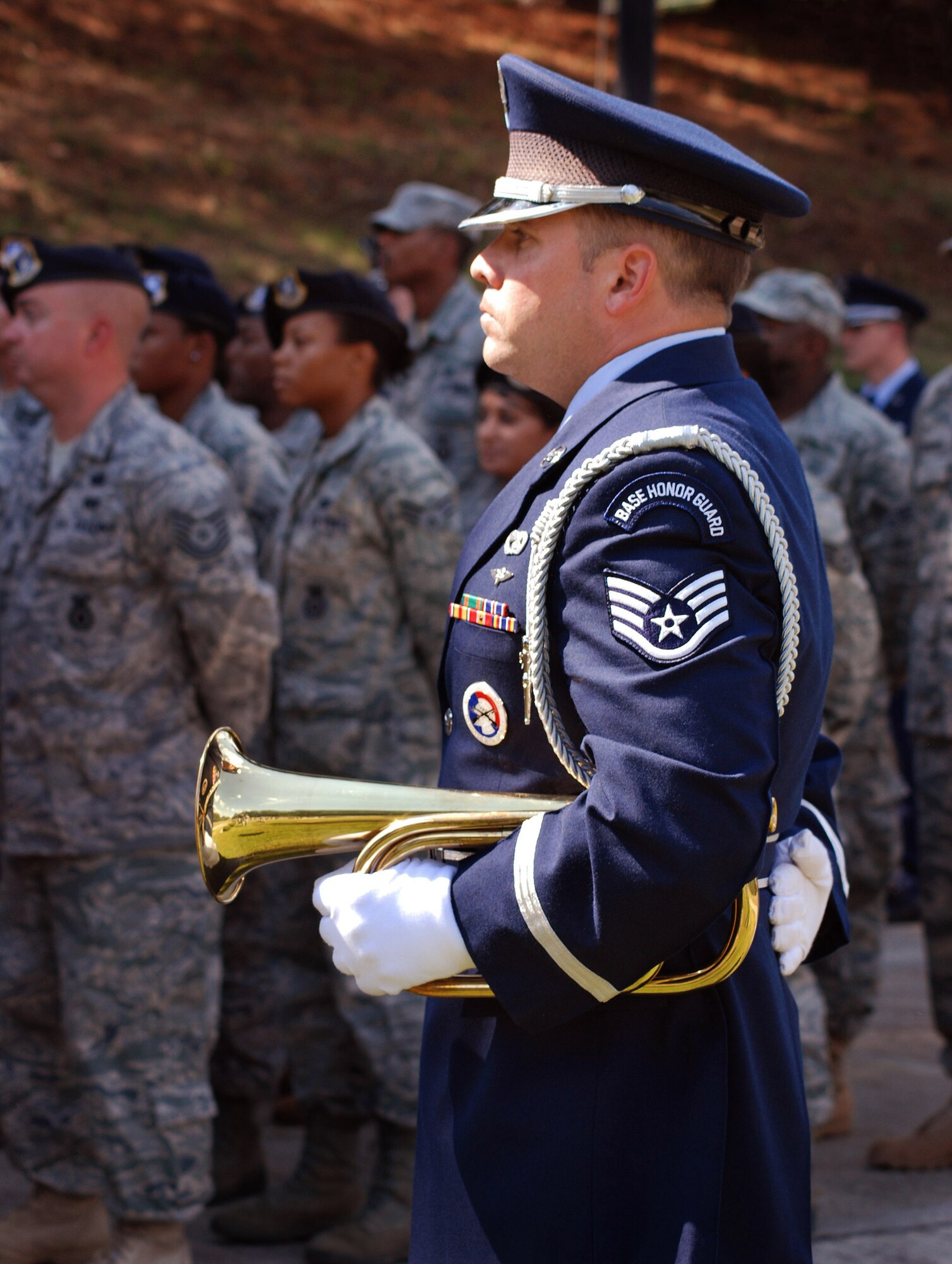 Staff Sgt. Aaron Abshire, 94th Airlift Wing Honor Guard bugler, stands-by during a retreat ceremony at Dobbins Air Reserve Base to honor the 10th anniversary of the 2001 terrorist attacks, Sept 11.   (U.S. Air Force photo/ Master Sgt. Stanley Coleman)