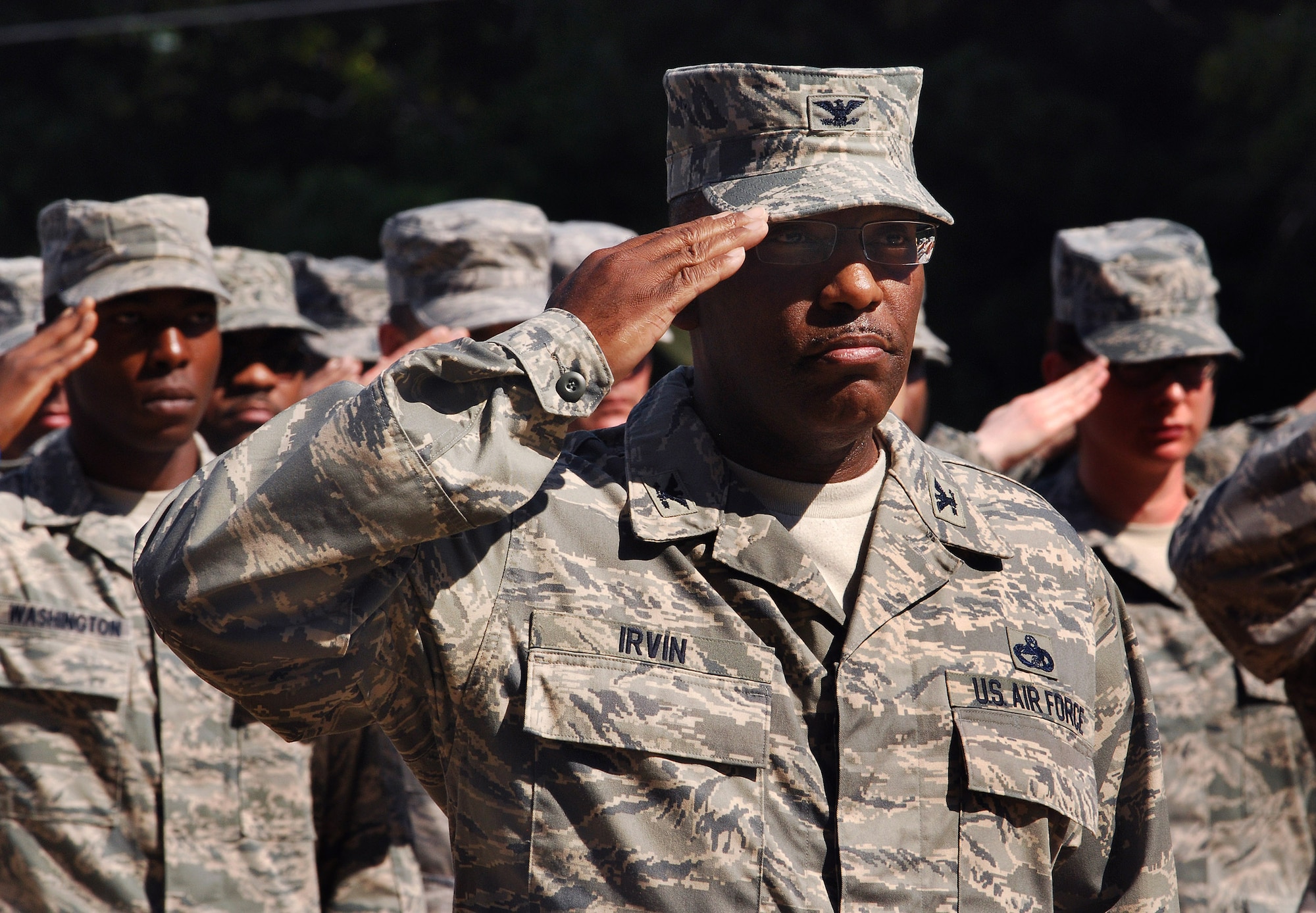 Col. Marshall Irvin Jr., 94th Mission Support Group commander, leads the Airmen of the 94th Airlift Wing in a salute to the U.S. flag during a retreat ceremony to honor the 10th anniversary of the 2001 terrorist attacks, Sept 11.   (U.S. Air Force photo/ Brad Fallin)