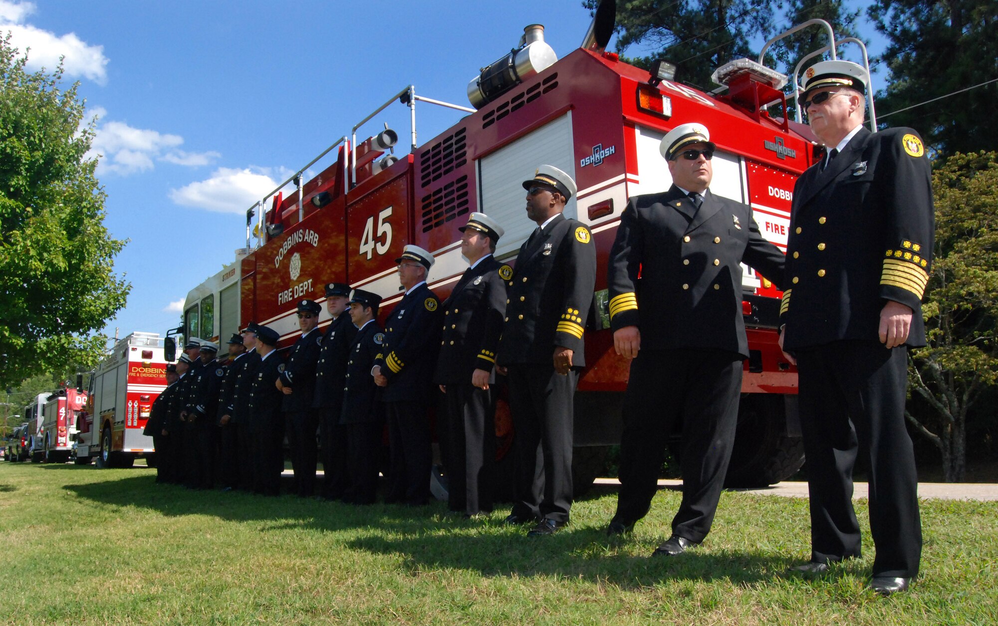 Firefighters from the 94th Airlift Wing are attending a retreat ceremony on Dobbins Air Reserve Base, to honor the 10th anniversary of the 2001 terrorist attacks, Sept 11.   (U.S. Air Force photo/ Senior Airman Christina Bozeman)