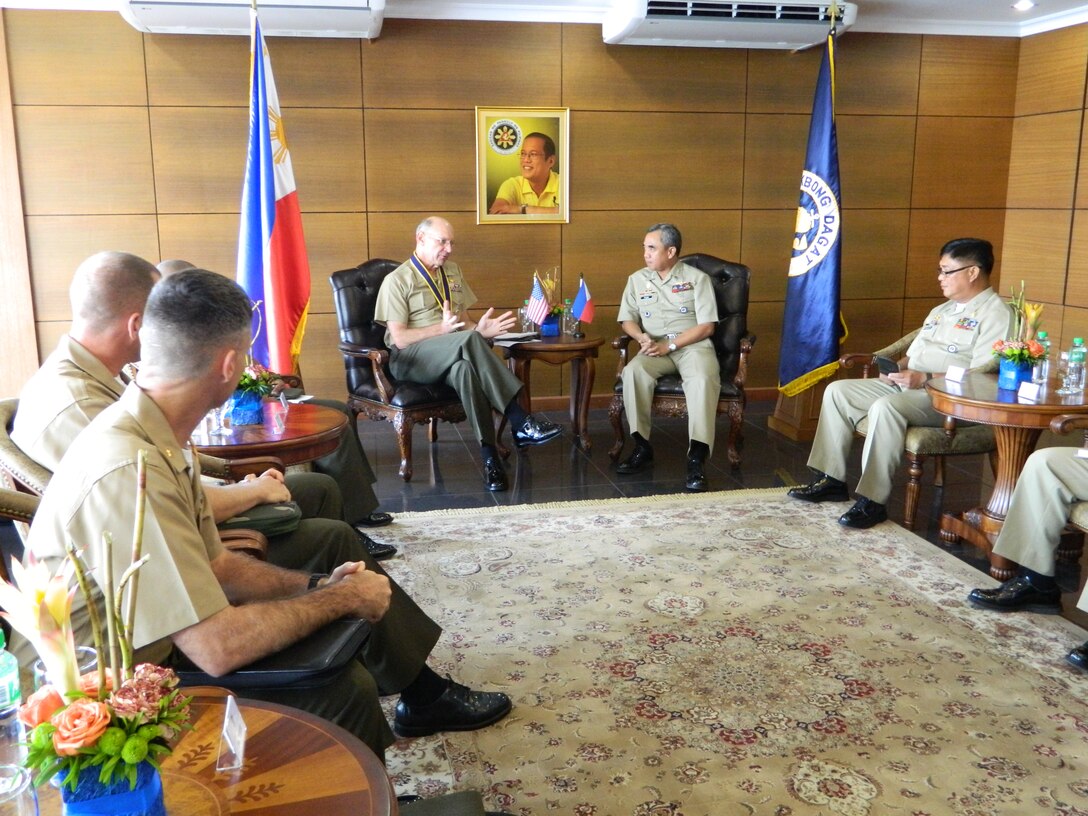 Lt. Gen. Duane D. Thiessen, left center, commander of U.S. Marine Corps Forces, Pacific, meets with Adm. Alexander Pama, flag officer in command of the Philippine Navy, and principal staff during a visit to the Philippine Navy headquarters, Sept. 14. Thiessen visited the Philippines to meet with the U.S. ambassador, U.S. and Filipino military officials, and component commanders from the Armed Forces of the Philippines.