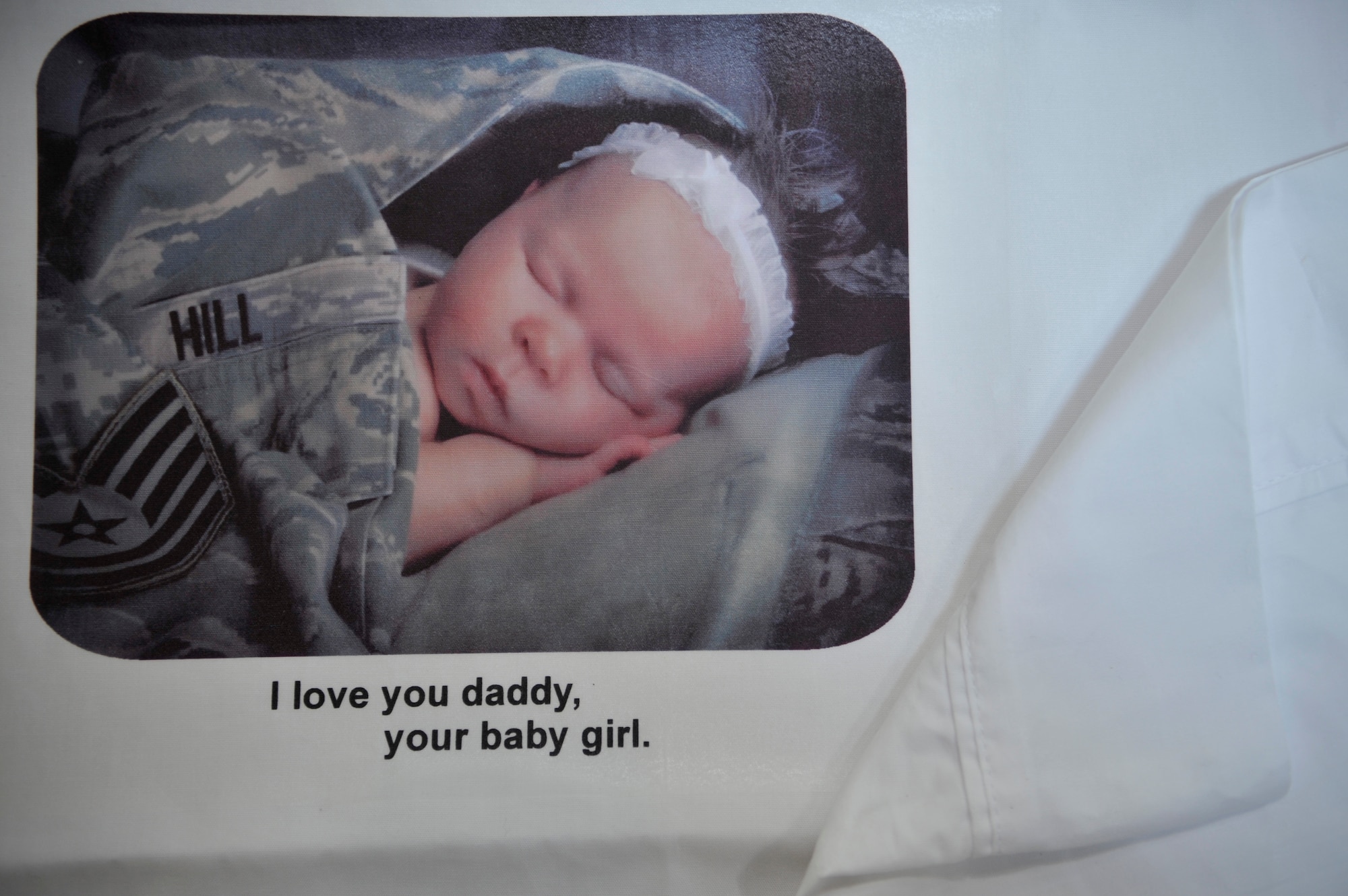VANDENBERG AIR FORCE BASE, Calif. -- A Global Hearts custom pillow case is one of multiple items given to deployed military members at the Airman and Family Readiness Center here Wednesday, Sept. 7, 2011. The Global Hearts Group supports deployed military members and their dependents with donated and purchased items supplied at the Airman and Family Readiness Center. (U.S. Air Force photo/Staff Sgt. Andrew Satran) 

 
  

   