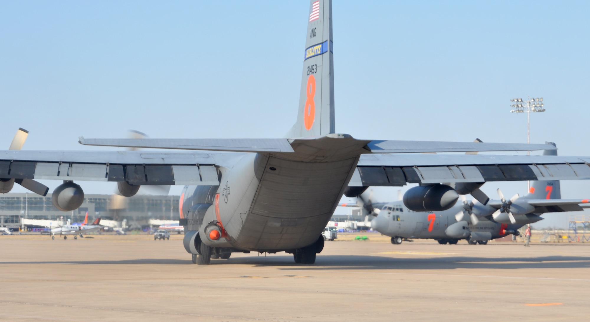 A Modular Airborne Firefighting System-equipped C-130 Hercules taxis for takeoff Sept. 12 at Austin-Bergstrom International Airport in Austin, Texas. Four C-130s, assigned to the 302nd Air Expeditionary Group, provided fire retardant support Sept. 12 to two fires raging throughout northeast Texas. (U.S. Air Force photo/Staff Sgt. Stephen J. Collier)