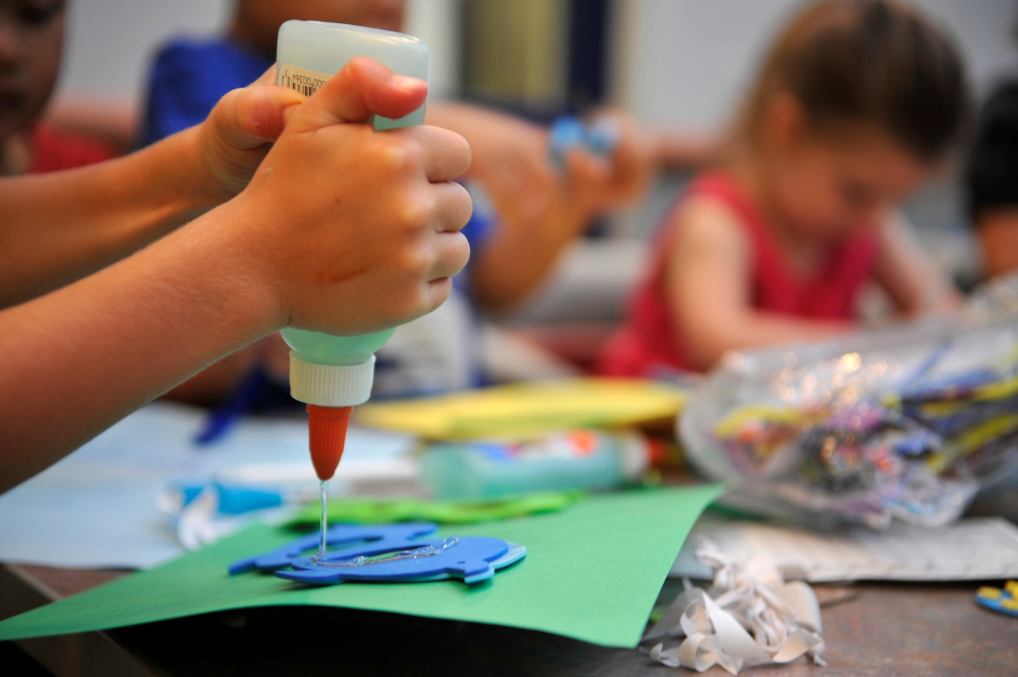VANDENBERG AIR FORCE BASE, Calif. -- Arts and Crafts are one of multiple activities for dependents of deployed Vandenberg members to enjoy at a Global Hearts Group Family Night Out event at Breakers Dining Facility here Thursday, Aug. 25, 2011.  (U.S. Air Force photo/Staff Sgt. Andrew Satran) 

  