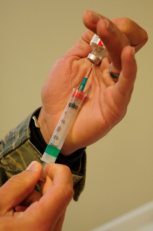 VANDENBERG AIR FORCE BASE, Calif. – A syringe is prepared to inject the influenza vaccination at the medical clinic here Tuesday, Sept. 13, 2011. The influenza vaccine is meant to inoculate against the current strain of the flu. (U.S. Air Force photo/Senior Airman Lael Huss)