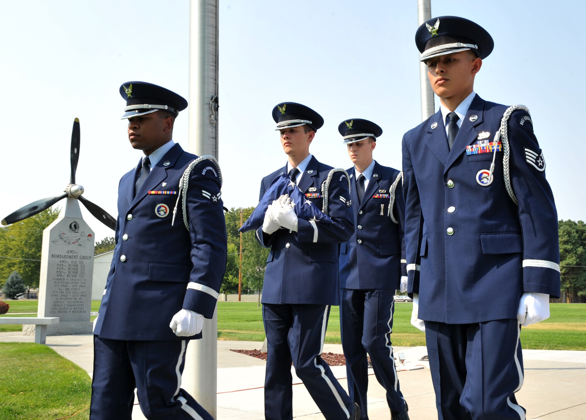 MOUNTAIN HOME AIR FORCE BASE, Idaho – Base honor guard members carry a flag during the retreat ceremony here, Sept. 9. All members of the honor guard have the responsibility of representing the United States of America and the Air Force in a variety of military and civilian ceremonies. (U.S. Air Force photo by Airman 1st Class Heather Hayward)