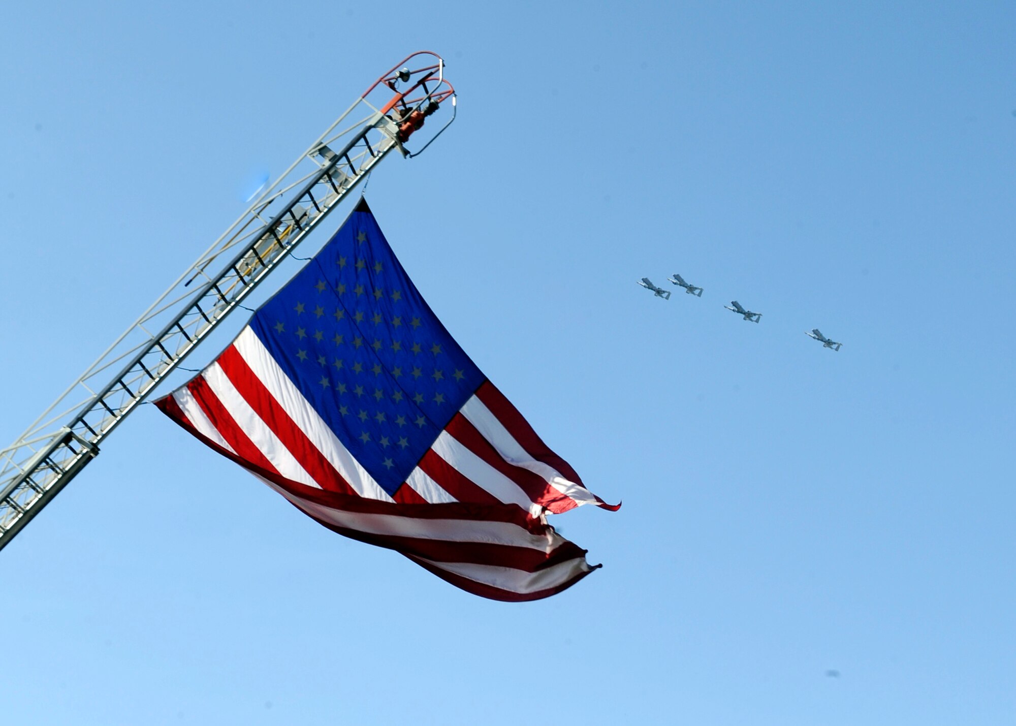 MOUNTAIN HOME, Idaho – Four A-10C Thunderbolt II aircraft perform a flyover at the beginning of the Air Force Appreciation Day Parade here, Sept. 10. The jets were from the Idaho Air National Guard 124th Fighter Wing. (U.S. Air Force photo by Senior Airman Angelina Drake)