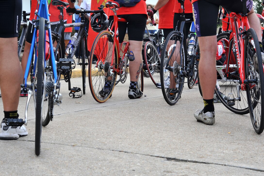 U.S. veterans take a break during the Warrior Ride 9/11 Tribute Chesapeake Community Challenge at Joint Expeditionary Base Little Creek-Fort Story, Va., Sept. 9, 2011. The two day event allowed retired and active duty military members from the Hampton Roads area cycle a total of 46 miles. (U.S. Air Force photo by Airman 1st Camilla Griffin/Released)