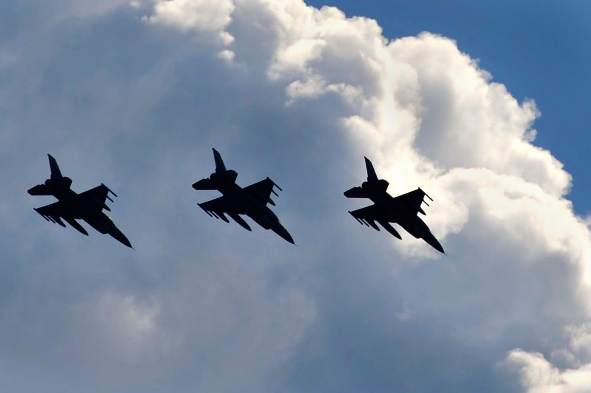 U.S. Air Force 77th Fighter Squadron F-16 Fighting Falcons, pass over Shaw Air Force Base, S.C., on their final approach as they return from a deployment in support of Operation Unified Protector, Sept. 12, 2011. The mission of the 77th FS pilots is to provide air suppression and destruction of enemy defenses. (U.S. Air Force photo by Senior Airman Kenny Holston/Released)


