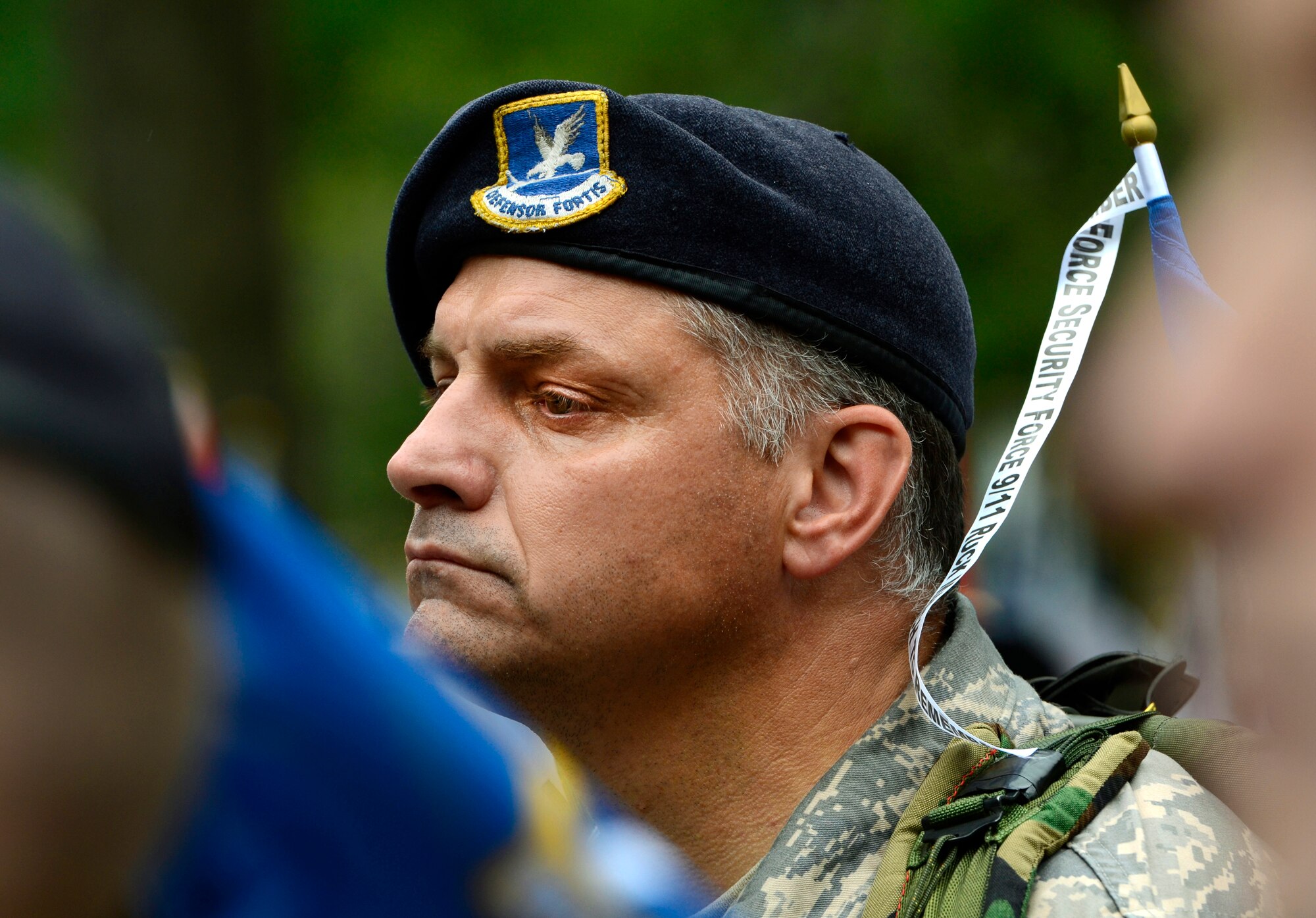 Master Sgt. Frank Berlanga reflects on the loss of his lifelong friend and coworker of Staff Sgt. Jerome Dominguez during the culminating ceremony of the Security Forces 9/11 Ruck to Remember in Battery Park, N.Y., Sept. 11. Sgt. Dominguez, a member of the New York Air National Guard, was killed while helping to save lives as a NYC police officer in the World Trade Center terrorist attacks. Sgt. Berlanga marched in the last leg of the 2,100 mile march into Lower-Manhattan. (U.S. Air Force photo/Tech. Sgt. Bennie J. Davis III)