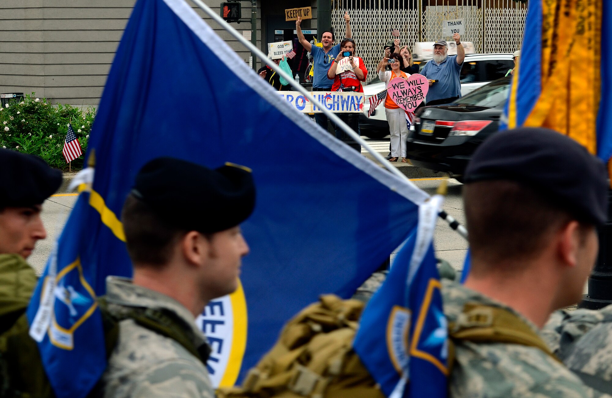 Patriotic New Yorkers line the streets cheering on U.S. Air Force Security Forces airmen marching on the last leg of the Security Forces 9/11 Ruck to Remember ending in Battery Park, N.Y., Sept. 11. Security Forces defenders marched over two months and 2,100 miles from San Antonio, Texas to NYC to honor the security forces members and Americans who died on 9/11 and in the ensuing wars. (U.S. Air Force photo/Tech. Sgt. Bennie J. Davis III)