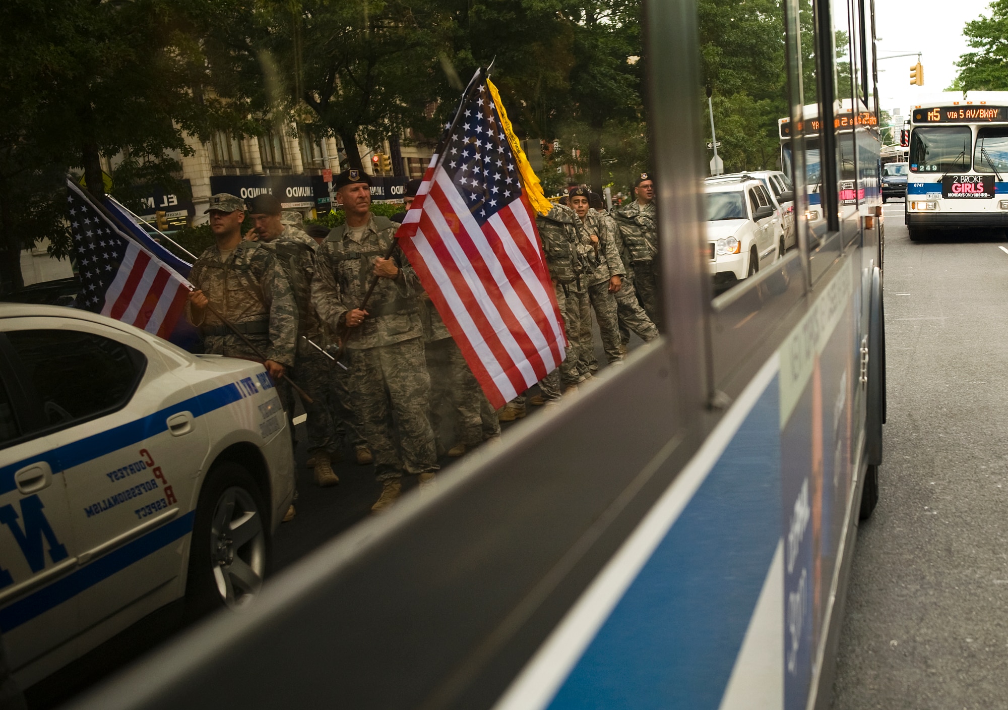 U.S. Air Force Security Forces airmen march down Broadway Ave. through the Borough of Queens in NYC while participating in the Security Forces 9/11 Ruck March to Remember Sept. 10. SFS members started the second-to-last day of the ruck in Danville, N.J. and marched 34 miles to Times Square. (U.S. Air Force photo/Tech. Sgt. Bennie J. Davis III)