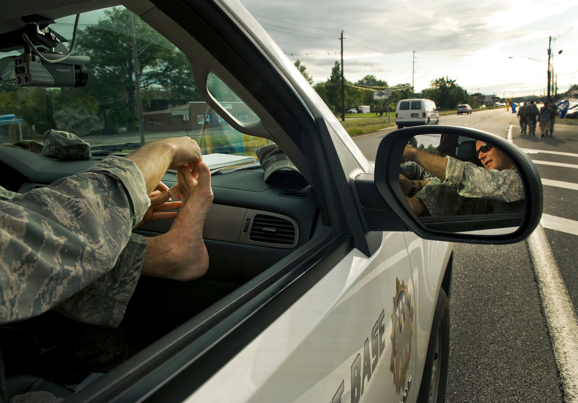 Master Sgt. Chris Wright places moleskin over the blisters on his feet before participating in he Security Forces 9/11 Ruck March to Remember Sept. 10 in Denville, NJ. Master Sgt. Wright, the operations superintendent at the 87th Security Forces Squadron at Joint Base McGuire-Dix-Lakehurst, N.J led 25 other security forces Airmen from Hazelton, Pa., to Times Square and marched more than 70 miles himself through their four-day march.(U.S. Air Force photo/Tech. Sgt. Bennie J. Davis III)