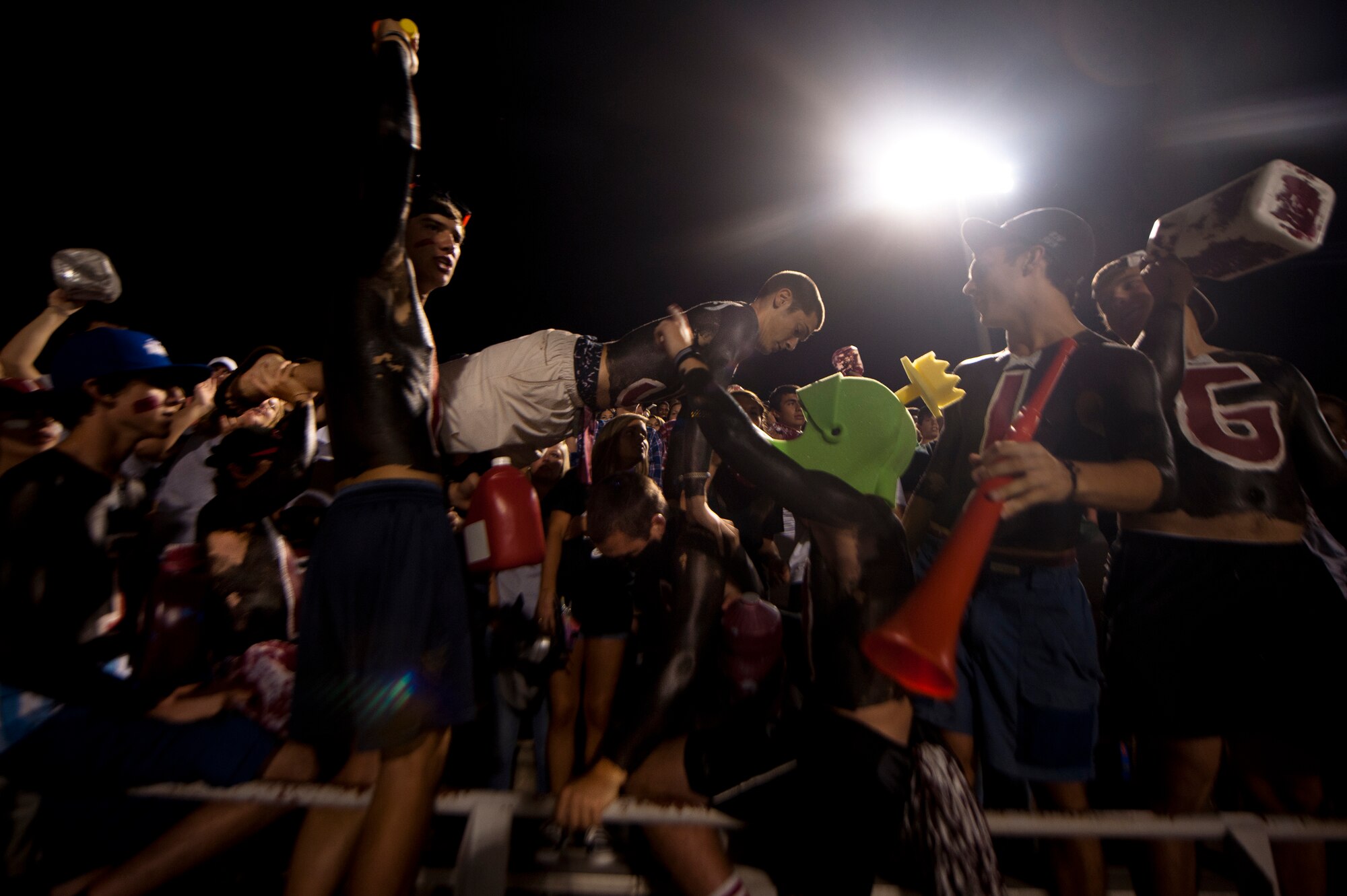 Lowndes High School Vikings fans cheer and do push-ups for the number of points their team has during a game between the Lowndes High-School Vikings and Tallahassee Leon Lions at Martin Stadium, Valdosta, Ga., Sept. 9, 2011. Nicknamed “The Concrete Palace” Martin Stadium has a seating capacity of 10,000. (U.S. Air Force photo by Airman 1st Class Joshua Green/Released)
