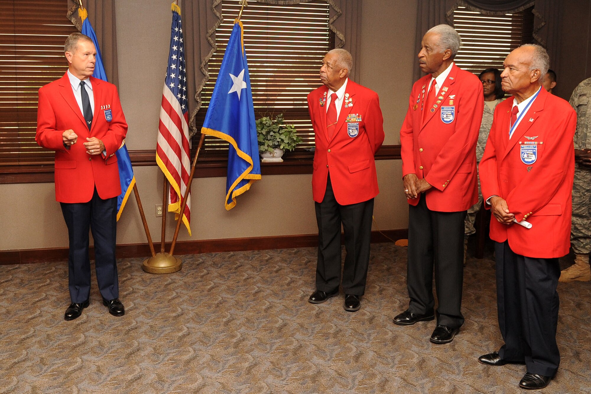 U.S. Air Force Gen. William M. Fraser III, commander of Air Combat Command, expresses his gratitude to the Tidewater Chapter-Tuskegee Airmen Incorporated during the Honorary Tuskegee Airmen event at Langley Air Force Base, Va., Sept. 8, 2011. Fraser became an honorary member of the Tidewater chapter for multiple reasons, most notably for his efforts to erect a Tuskegee Airmen Memorial at Langley. (U.S. Air Force photo by Airman 1st Class Racheal Watson/Released)