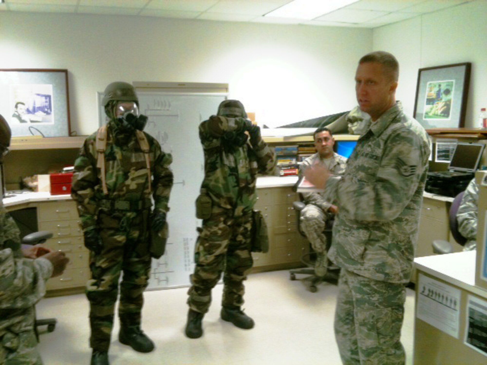HOMESTEAD AIR RESERVE BASE, Fla. -- Members of the 482nd Communications Squadron here participate in impromptu Mission Oriented Protective Posture training on Sep. 11. The entire 482nd is preparing for a major inspection, which will take place next year. (US Air Force photo)