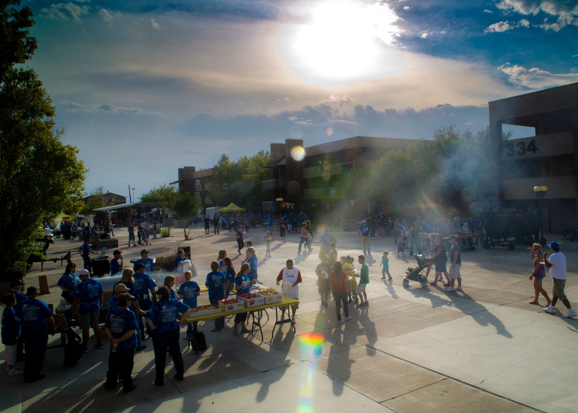 HOLLOMAN AIR FORCE BASE, N.M. -- Volunteers from the local community serve food to members of Holloman in the dormitory courtyard Sept. 9, 2011, during this year’s “Thanks Team Holloman.” This annual event is hosted by the Committee of 50 and local businesses from Alamogordo to show their appreciation for Team Holloman. (U.S. Air Force photo by Airman 1st Class Joshua Turner/Released) 