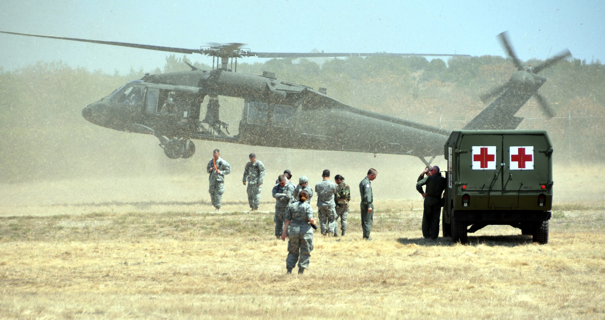 An Army Blackhawk helicopter from the 7th Battalion – 158th Aviation Regiment, Fort Hood, lands to pick up another load of simulated casualties during day one of the joint Mass Casualty Exercise held at the Army Reserve Center, Fort Worth September 10 and 11.  Medical personnel from the 301st MDS, Army, Navy and other emergency responders participated in the exercise. The exercise which pulled together military and civilian units and emergency responders from around the area was used to sharpen the operational skills and procedures of the organizations during joint operations.  (U.S. Air Force photo/Staff Sgt Chris Bolen)