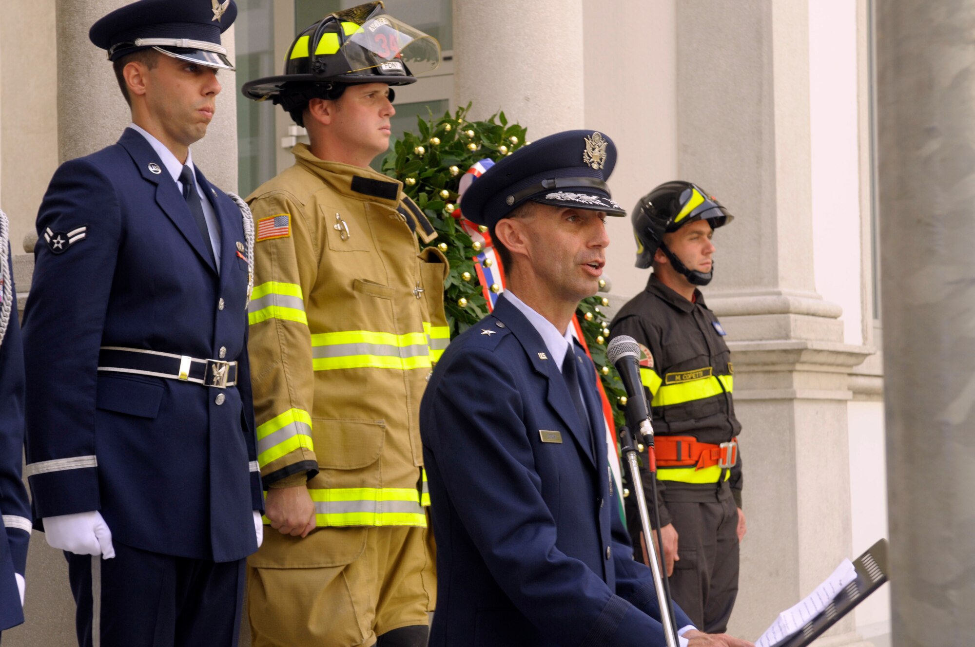 Brig. Gen. Scott Zobrist, 31st Fighter Wing commander, addresses the audience during a 9/11 commemoration Sept. 10 at the Italian-American Friendship Festival in Maniago, Italy. (U.S. Air Force photo/2nd Lt. Joseph Alonso)