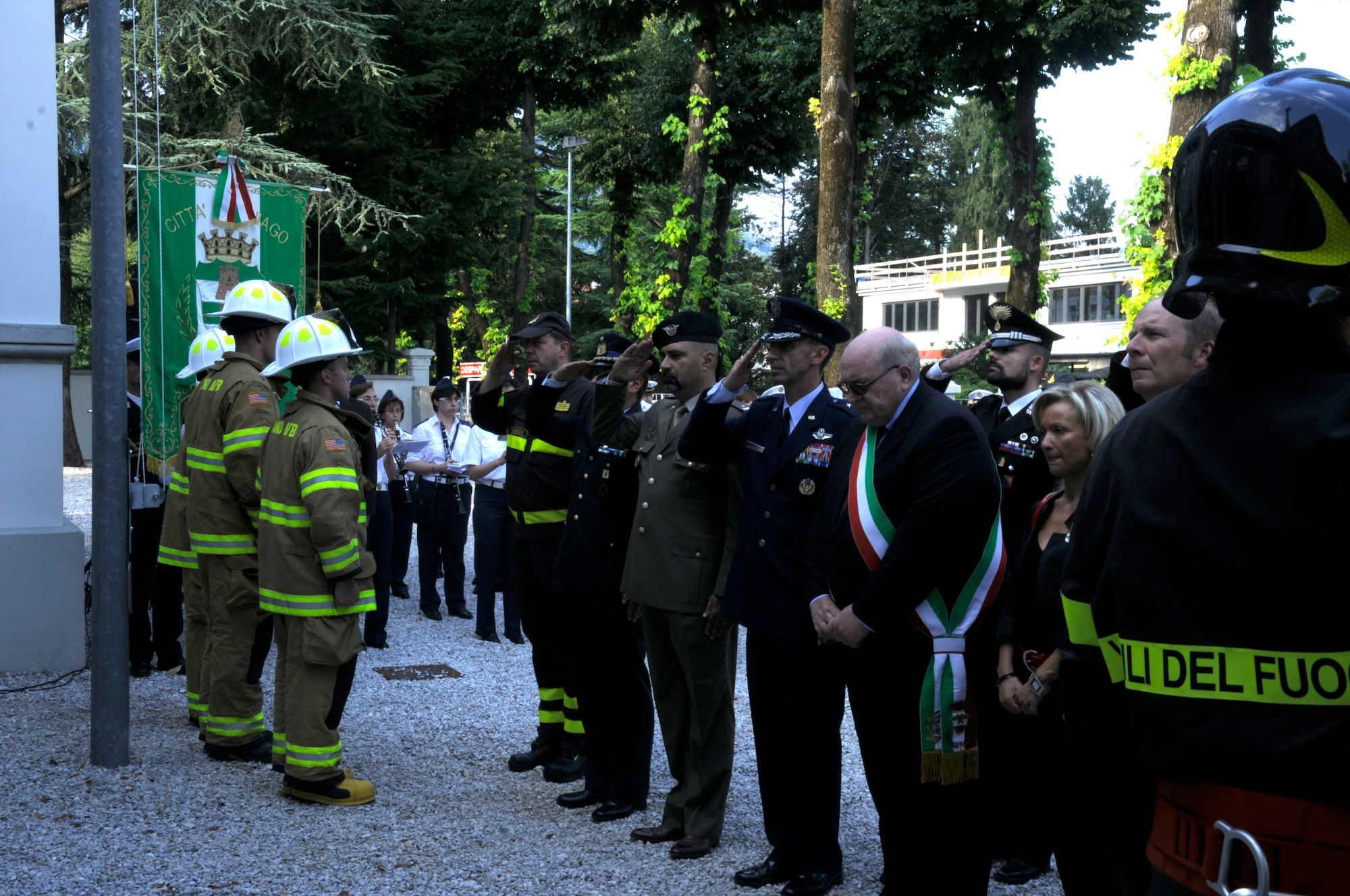 Aviano Air Base firefighters and Italian community leaders gather during a 9/11 commemoration Sept. 10 at the Italian-American Friendship Festival in Maniago, Italy. (U.S. Air Force photo/2nd Lt. Joseph Alonso)