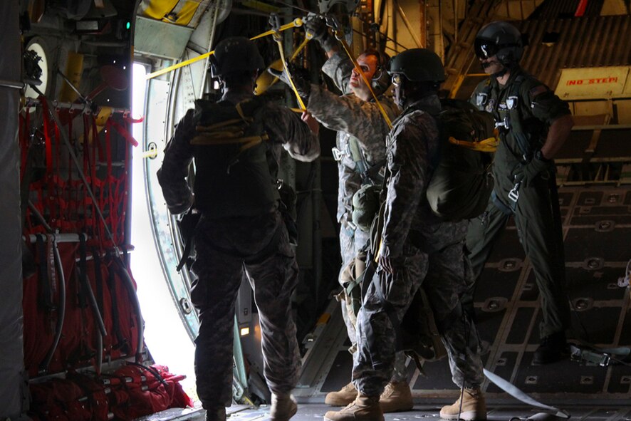 PITTSBURGH, PA -- Members of the C-219 Special Forces Group (Airborne) prepare to jump from a C-130 Hercules during the Wings Over Pittsburgh 2011 Air Show, Sept. 11. The jump was one of the many aerial demonstrations performed at the air show. (U.S Air Force/Senior Airman Jonathan Hehnly)
