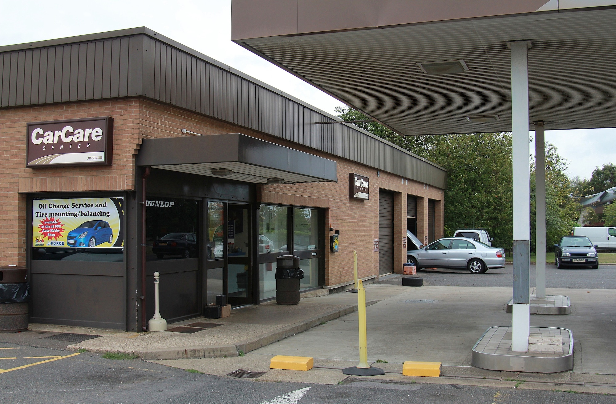 ROYAL AIR FORCE LAKENHEATH, England - The car care center will close Oct. 1 and relocate its services to the shoppette, Building 650, next to the bowling center.  The shoppette?s current automotive section will expand and have a staffed service counter where customers can order tires, batteries and special order parts from the U.S. or U.K.  (U.S. Air Force photo by Staff Sgt. Connor Estes)