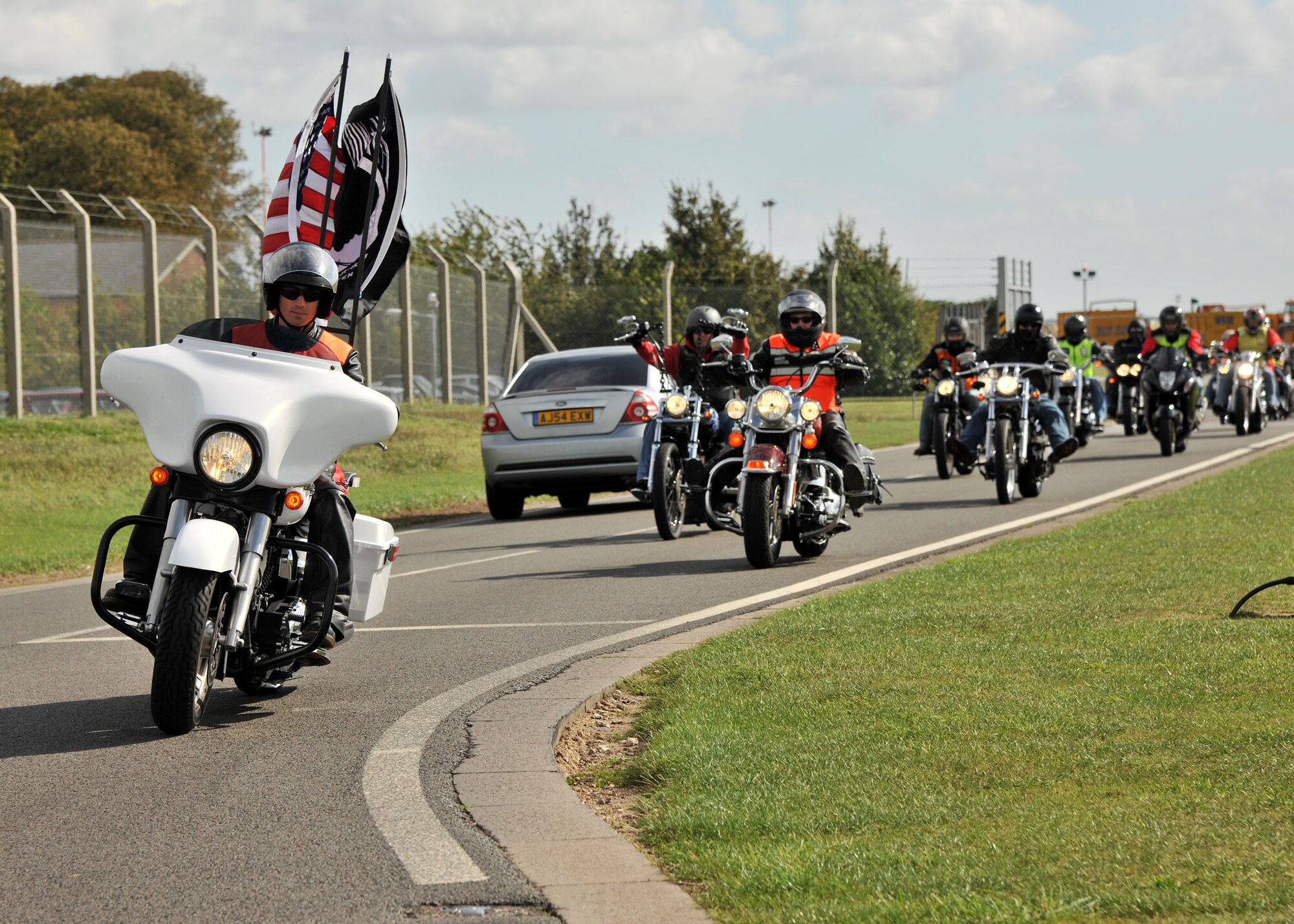 RAF MILDENHALL, England – Tech. Sgt Jonathan Richichi, 48th Communications Squadron, RAF Lakenheath, leads the Prisoner of War/Missing in Action Rolling Thunder Remembrance Motorcycle Ride here Sept. 13, 2011. The motorcycle ride began with the placing of a wreath at the POW/MIA memorial here and ended with the placing of another wreath at Memorial Park on RAF Lakenheath.  (U.S. Air Force photo Senior Airman Jerilyn Quintanilla)
