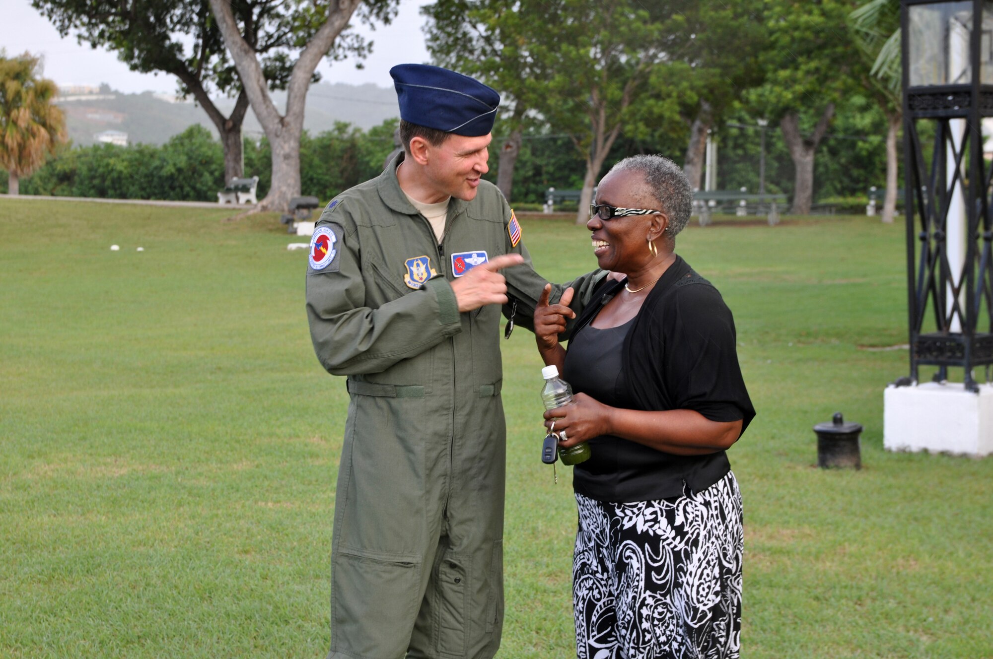 Lt. Col. Dave Borsi, 53rd Weather Reconnaissance Squadron pilot, stops to talk with Maria, a St. Croix resident, about Tropical Storm Maria Sept. 9. The Hurricane Hunters routinely operate out of St. Croix during storm season depending on storm location. Virgin Islands to fly the storm before evacuating to Homestead, Florida. (U.S. Air Force photo by Staff Sgt. Valerie Smock)