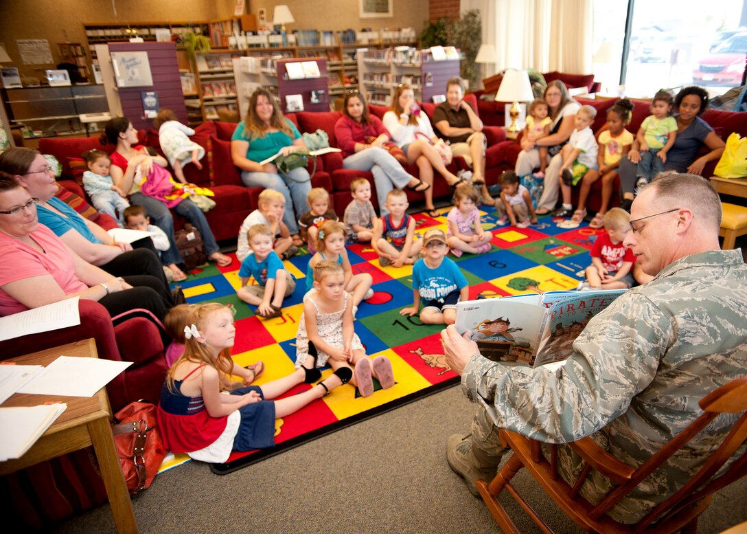 Col. Mark Weatherington, 28th Bomb Wing commander, reads to a group of children to kick off Little Warrior’s story time at the Holbrook Library on Ellsworth Air Force Base, S.D., Sept. 8, 2011. Following the reading, children have the opportunity to sing, dance and participate in crafts, every Thursday at 11 a.m., and again at 6 p.m. For more information, call the Holbrook Library at (605)385-1686. (U.S. Air Force photo by Tech. Sgt. Jerry Fleshman/Released)