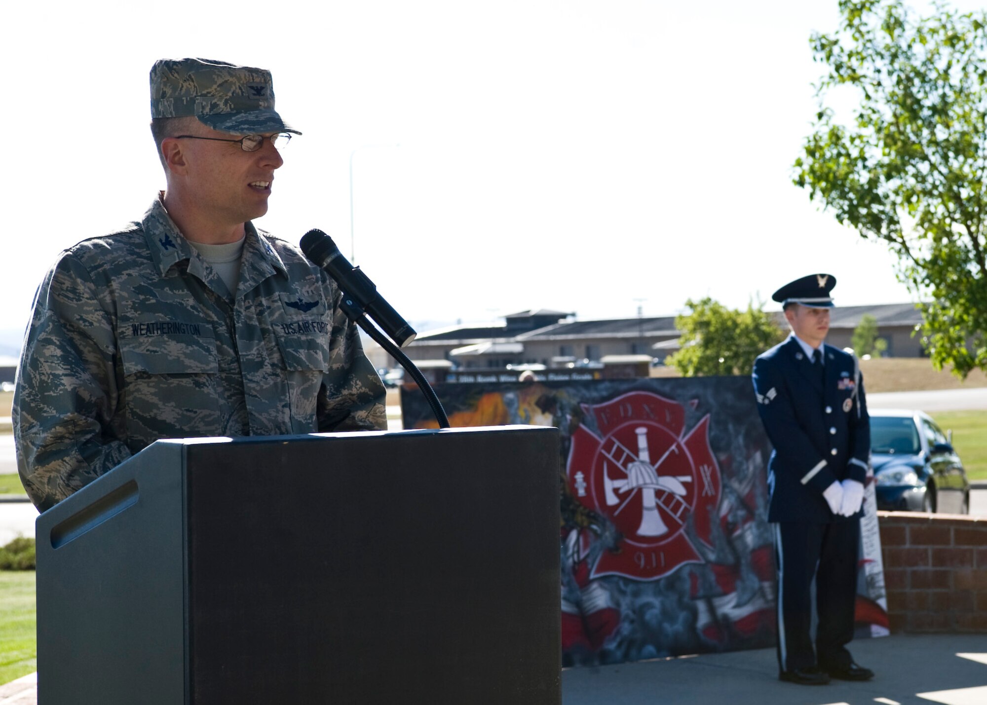 Col. Mark Weatherington, 28th Bomb Wing commander, talks about the significance of honoring America’s fallen during the POW/MIA and 9/11 Remembrance Retreat Ceremony on Ellsworth Air Force Base, S.D., Sept. 9, 2011. The ceremony consisted of the playing of Retreat and the Ellsworth Air Force Base Honor Guard retrieving the colors and folding the flag in front of the 28th Bomb Wing Headquarters. (U.S. Air Force photo by Airman Alystria Maurer/Released)
