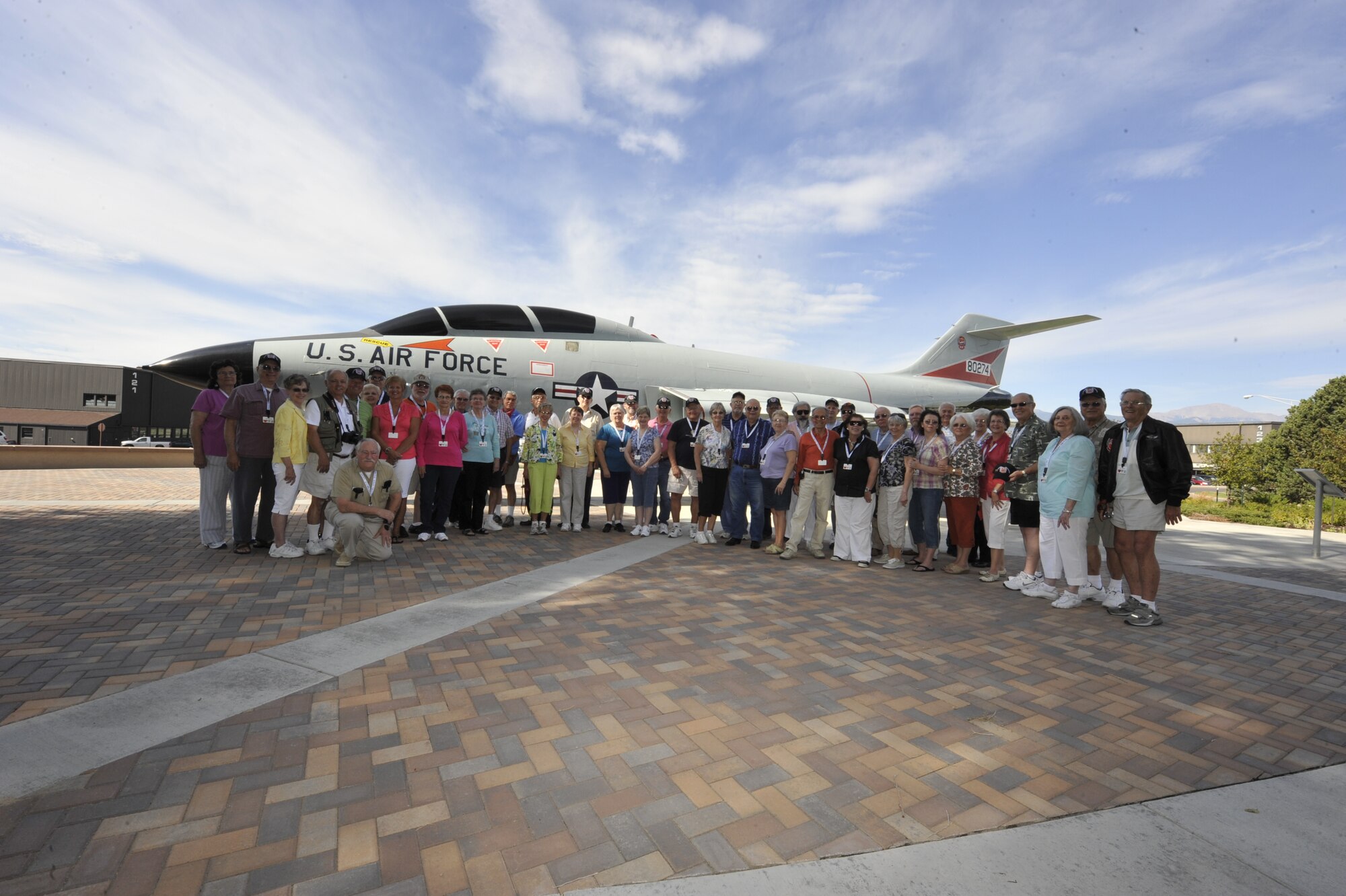 PETERSON AIR FORCE BASE, Colo.- Veterans and family members from the 13th Fighter Interceptor Squadron toured the Peterson Air and Space Museum Sept. 1, 2011. The 13th FIS was based at Glasgow AFB, Mont., in the 1960s, and provided air defense for a three-state area during the Cold War using the F-101B Voodoo. Many of the veterans had “hands-on” experience maintaining or flying the museum’s F-101B when it was assigned to the 13th FIS from 1964-1968. The aircraft is painted in 13th FIS colors and markings. (U.S. Air Force photo/Rob Bussard)