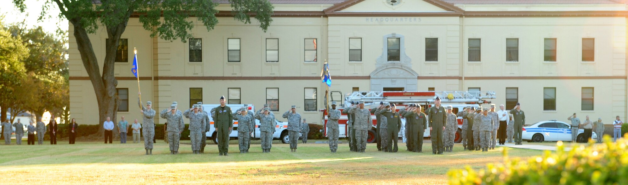 Airmen salute as Taps plays in front of wing headquarters on Barksdale Air Force Base, La., Sept. 9. Barksdale Airmen honored the victims of the terrorist attacks on the nation in 2001 with a September 11 remembrance ceremony. (U.S. Air Force photo/Airman 1st Class Benjamin Gonsier)(RELEASED)