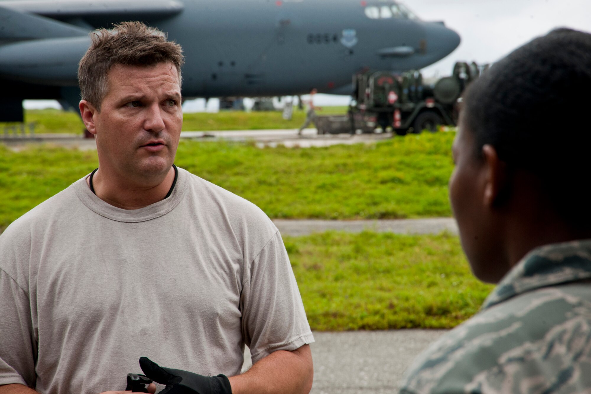 ANDERSEN AIR FORCE BASE, Guam—Tech. Sgt. Tobin Young, 36th Expeditionary Aircraft Maintenance Squadron crew chief,  explains the daily operations for maintainers of the B-52 Stratofortress  bomber during a Pacific Airpower Tour here Sep. 8. The Pacific Airpower Tour allows Airmen to see operations occurring around Andersen that they might not see during their day-to-day operations. (U.S. Air Force photo by Senior Airman Benjamin Wiseman/Released)