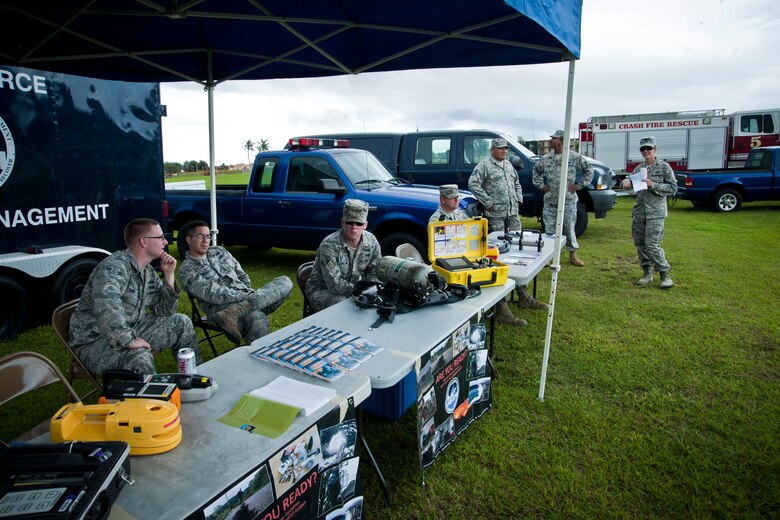 ANDERSEN AIR FORCE BASE, Guam—Personnel from Andersen’s Emergency Management and Bio-environmental flight prepare to showcase their abilities to members of the Andersen Youth Center here, Sep. 8. Several agencies, to include the fire department and police force, came out to support the showcase for National Preparedness Month.  (U.S. Air Force photo by Senior Airman Benjamin Wiseman/Released)