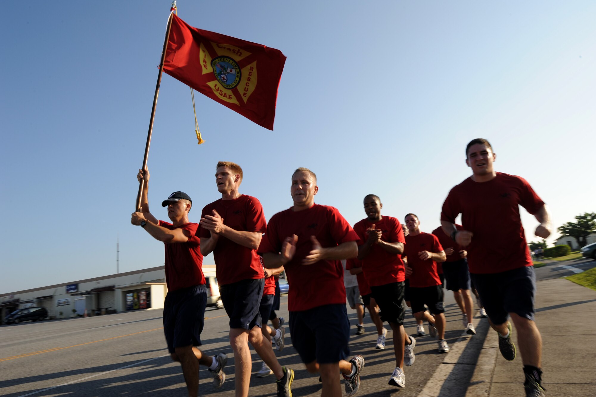 Members of the Kadena fire and emergency services participate in the 9/11 10K Run for the Fallen at Kadena Air Base, Japan, Sept.9.  Kadena members took part in run to pay tribute to the almost 3,000 men, women and children who lost their lives on Sept. 11, 2001. (U.S. Air Force photo/Airman 1st Class Jarvie Z. Wallace) 
