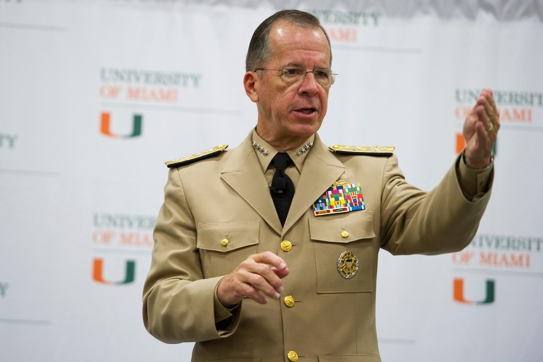 Navy Adm. Mike Mullen, chairman of the Joint Chiefs of Staff, addresses audience members at a meeting he calls "Conversations with the Country" at the University of Miami in Coral Gables, Fla., Sept. 13, 2011. 